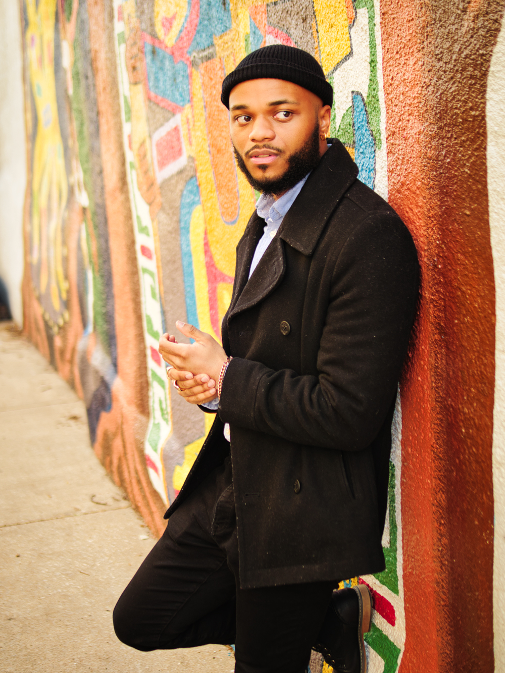 Portrait in Front of Lawrence Mural